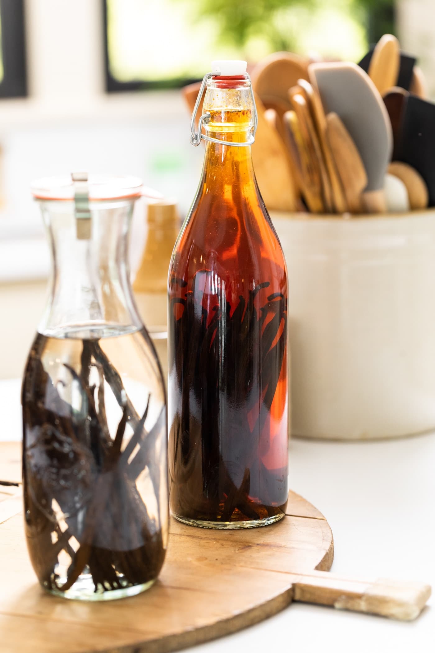 Homemade vanilla extract in a large bottle.