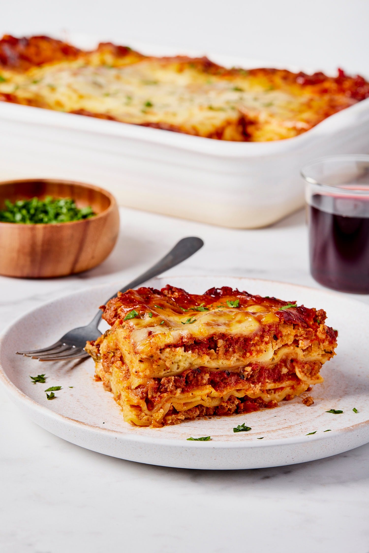 Square of lasagna showing all the interior layers.