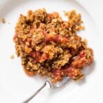 White plate with rhubarb crisp.