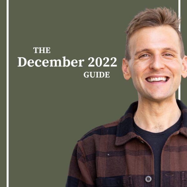 Kaleb Wyse wearing brown and black plaid shirt standing in front of dark green background with the words "The December 2022 Guide".