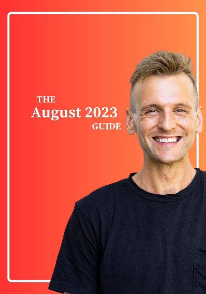 Kaleb Wyse smiling wearing black shirt standing in front of an orange and red gradient background with the words " The August 2023 Guide".