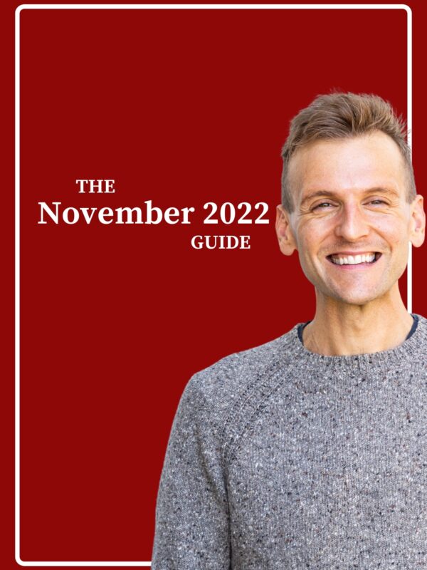 Kaleb Wyse wearing gray sweater standing in front of red background with words "The November 2022 Guide".