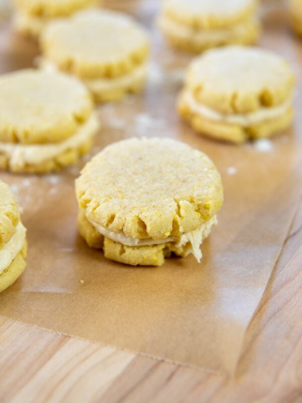 A cookie sits on parchment paper.