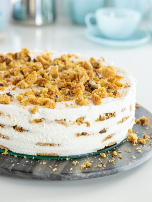 A round cookie cake sits on a serving platter.