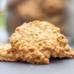 A cookie sits on a table.