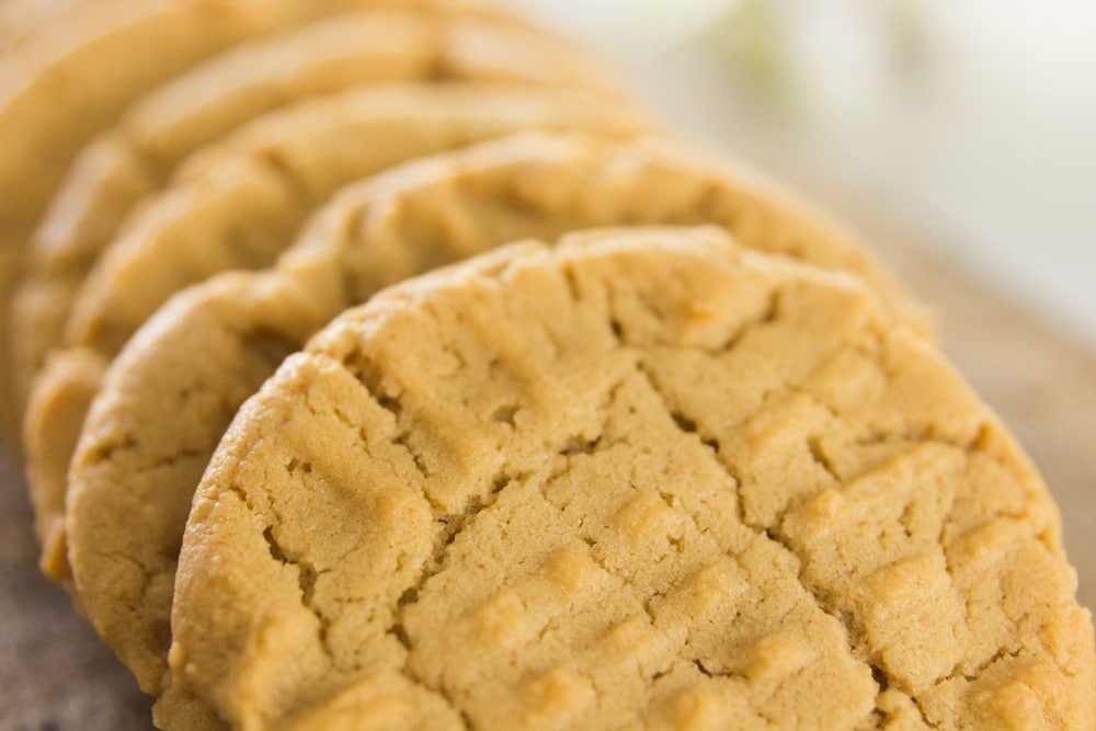 The up-close texture of a peanut butter cookie.