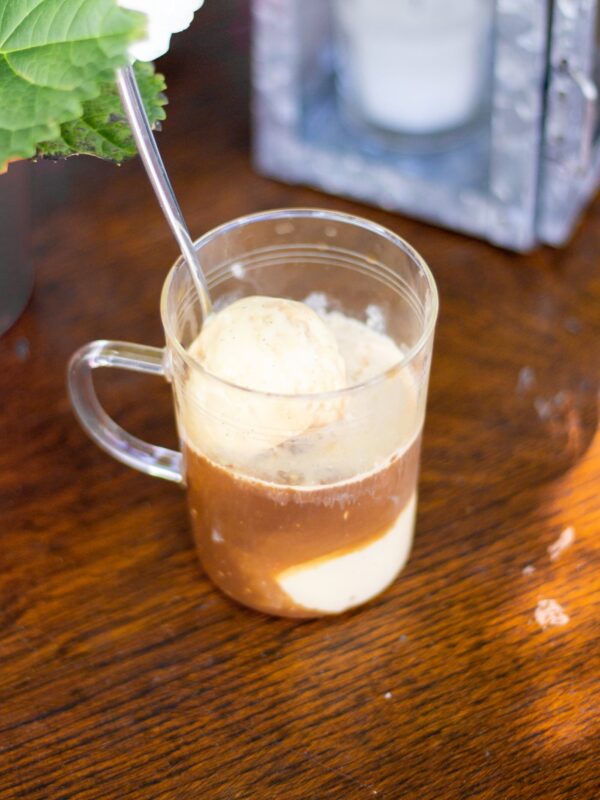 A mug with gelato and espresso.