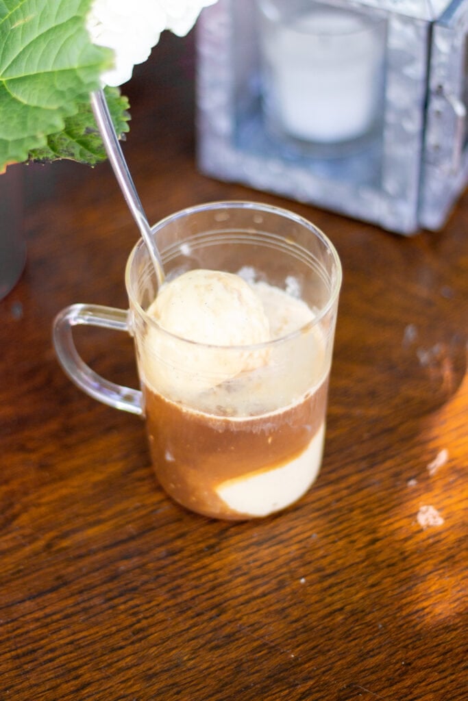 A mug with gelato and espresso.