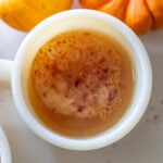 A mug full of spiced apple cider.