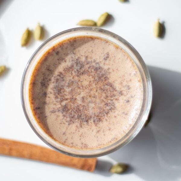 The top of a vanilla chai custard with spices.