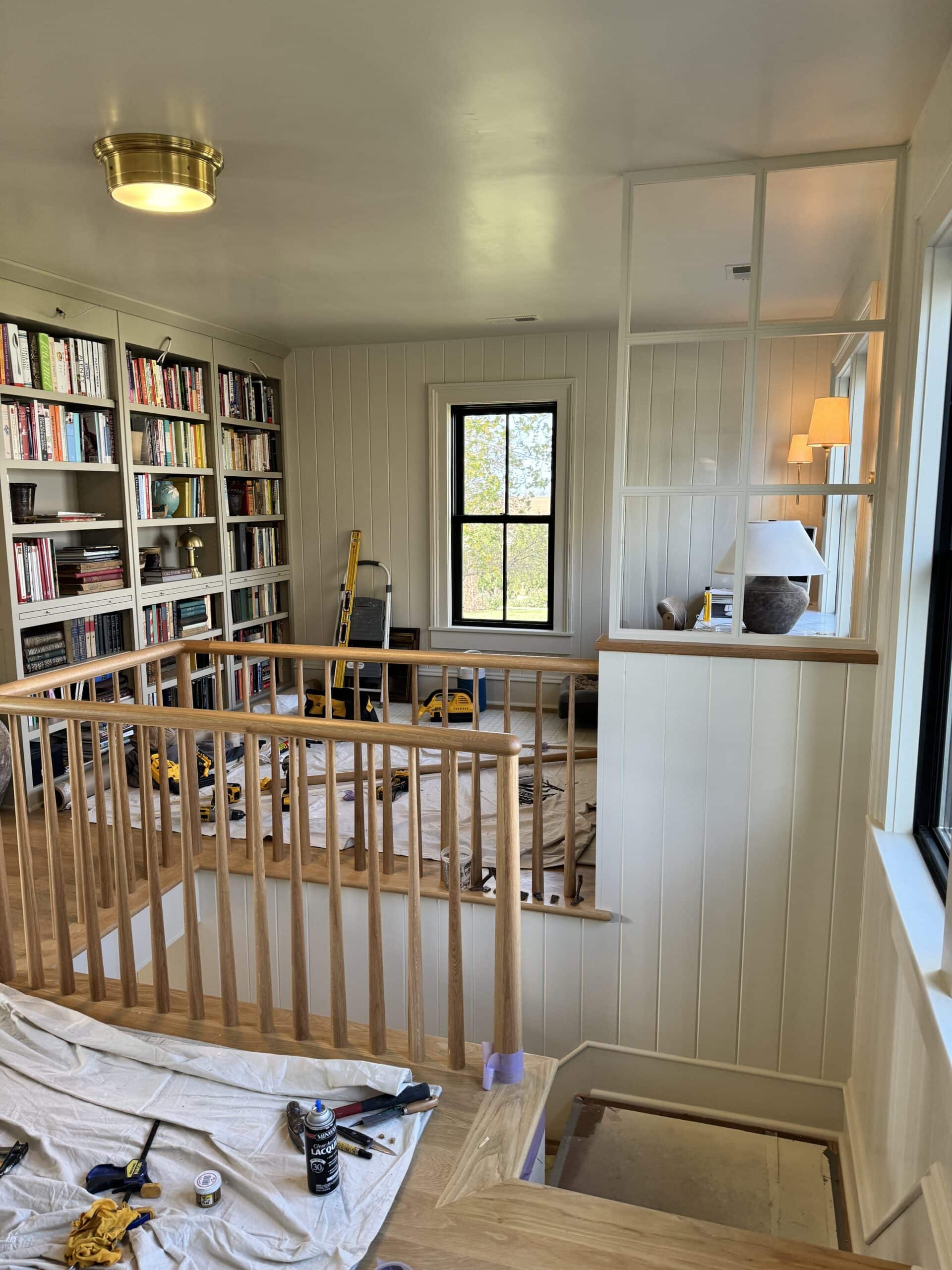 Upstairs office space with lots of tools all around being worked on after renovation.