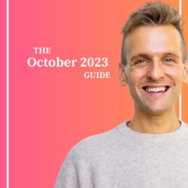 Kaleb Wyse wearing taupe sweater standing in front of ombre pink and orange background with the words The October 2023 Guide.