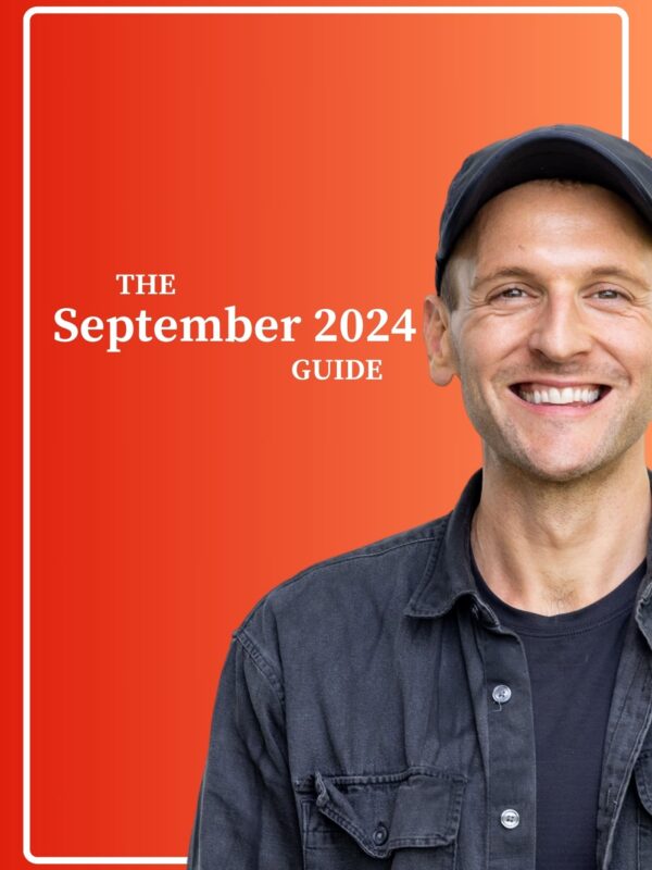 Kaleb Wyse standing in front of orange to red background wearing black clothes with the words "The September 2024 Guide".