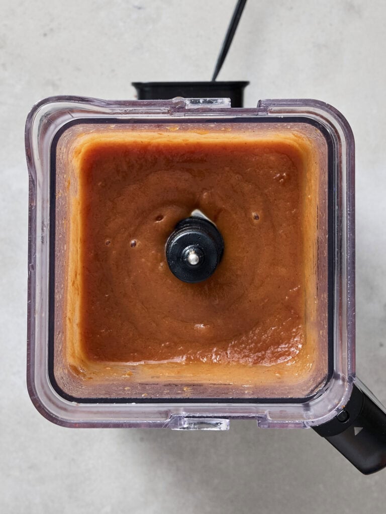 Blended apple butter mixture in blender.