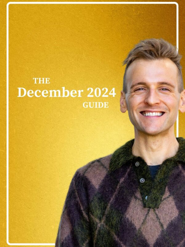 Kaleb Wyse wearing sweater standing in front of gold background with the words "The December 2024 Guide".