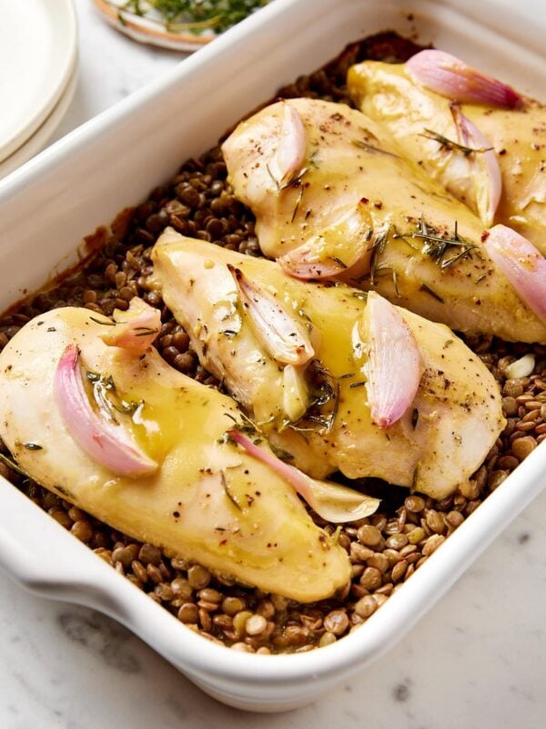 Honey mustard chicken breast on top of lentils.