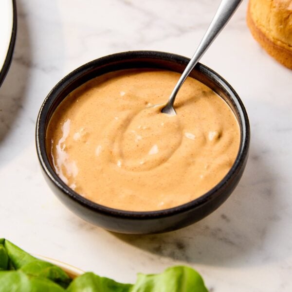 A small bowl full of mayo burger sauce.