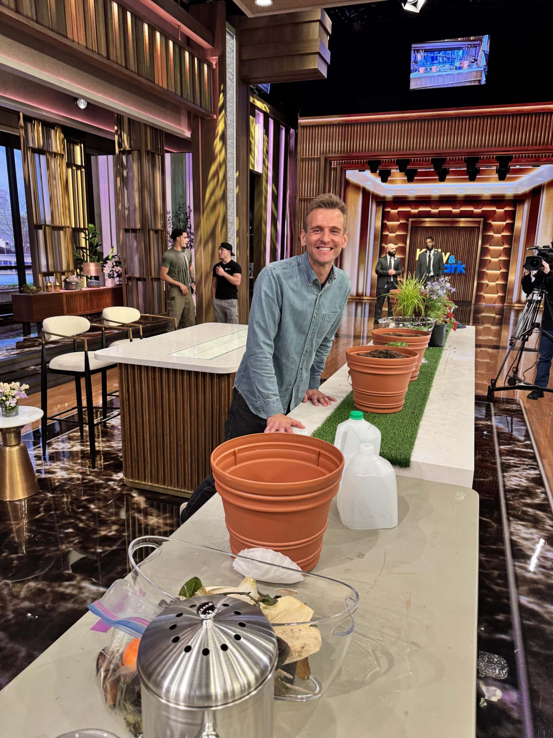 Kaleb Wyse standing in Live with Kelly & Mark studio waiting to film.