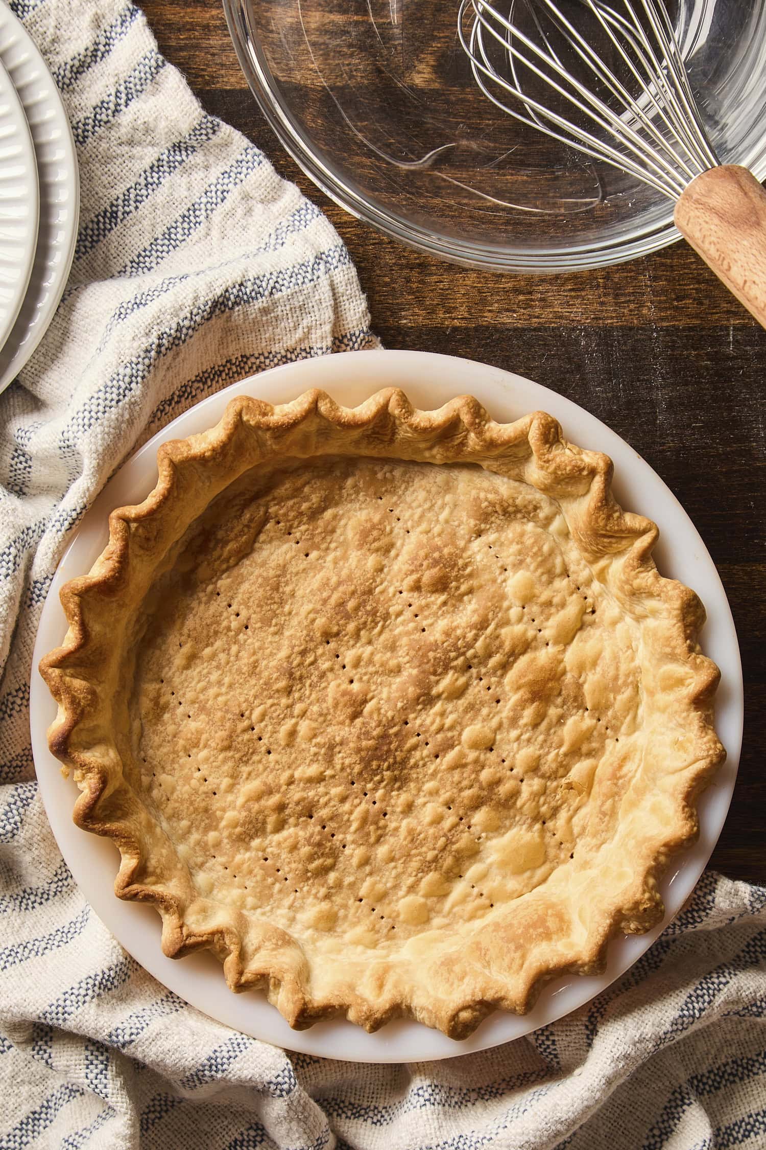 Baked pie crust with golden edges.