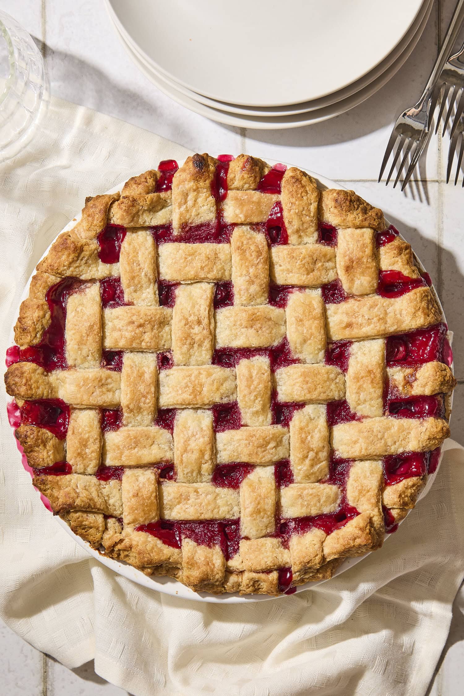 Baked cherry pie with lattice topping.