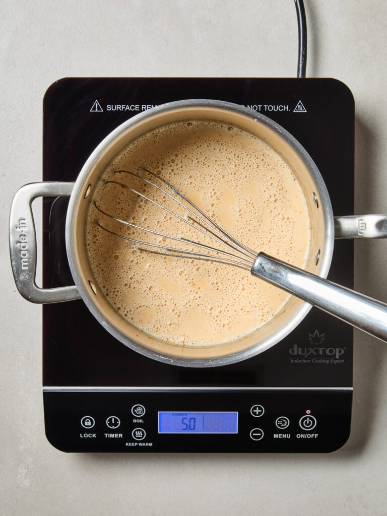 Pumpkin ice cream base on hot plate.