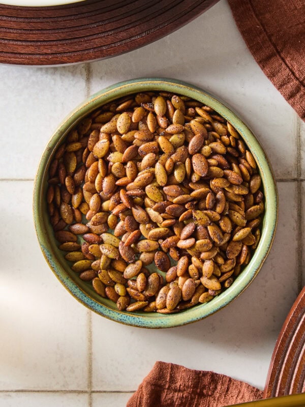 Roasted pepitas in a bowl.