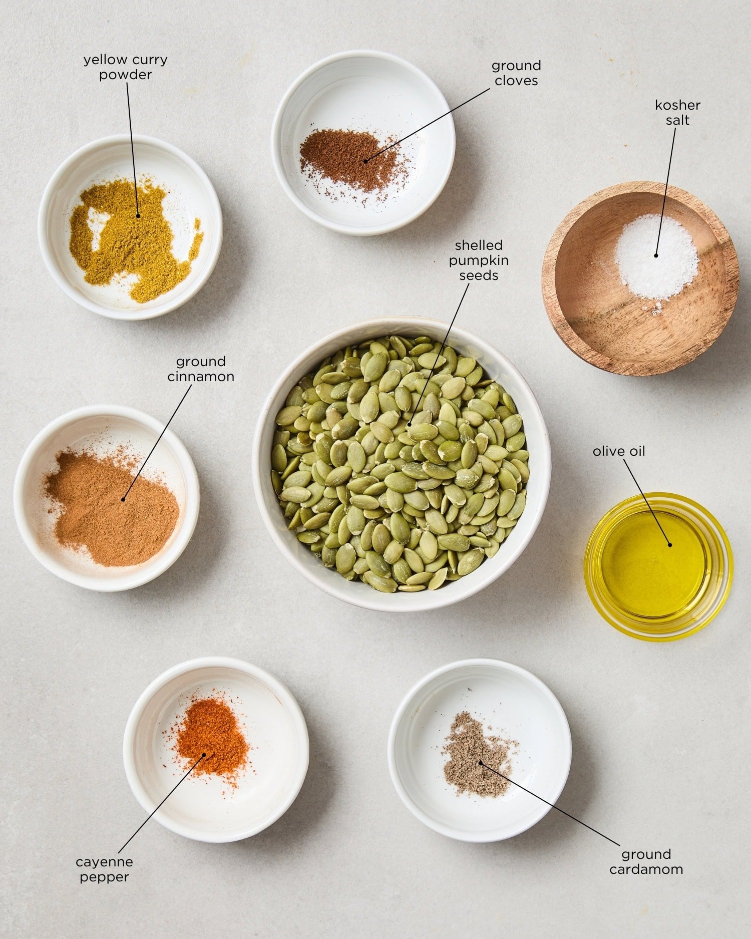 Surface filled with ingredients for pepitas with lots of spices.