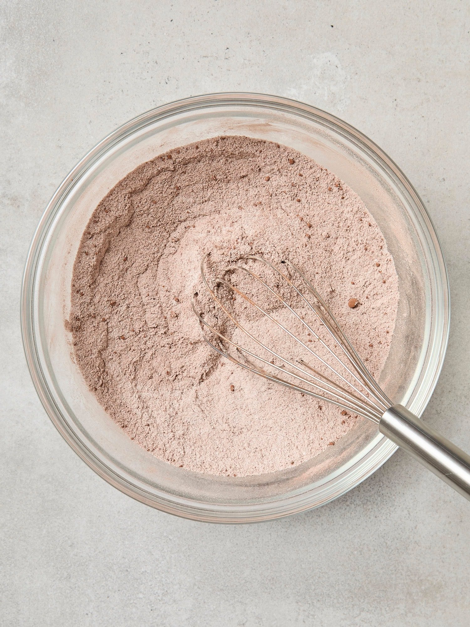 Glass bowl with dry ingredients for brownies.