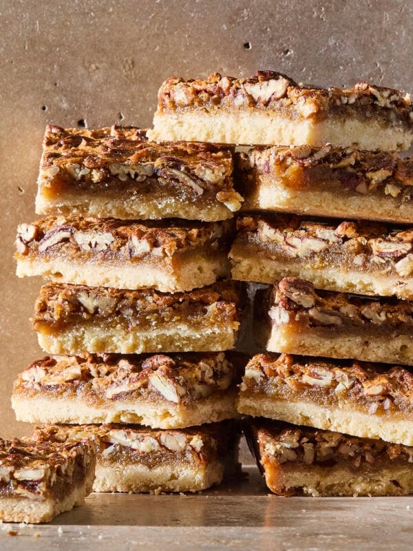 Stacks of pecan pie bars after being sliced.