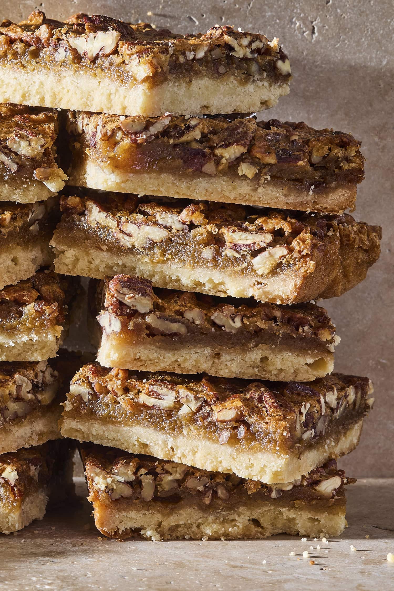 Stacks of pecan bars showing their layers.