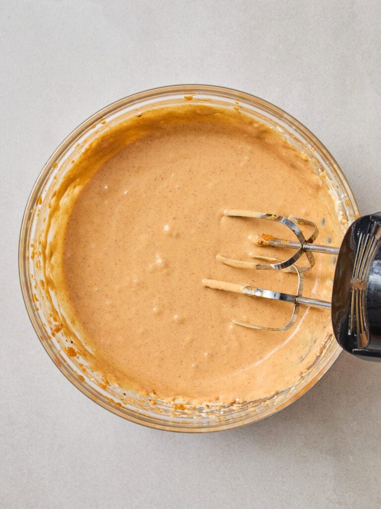 Pumpkin cheesecake batter after being mixed together.