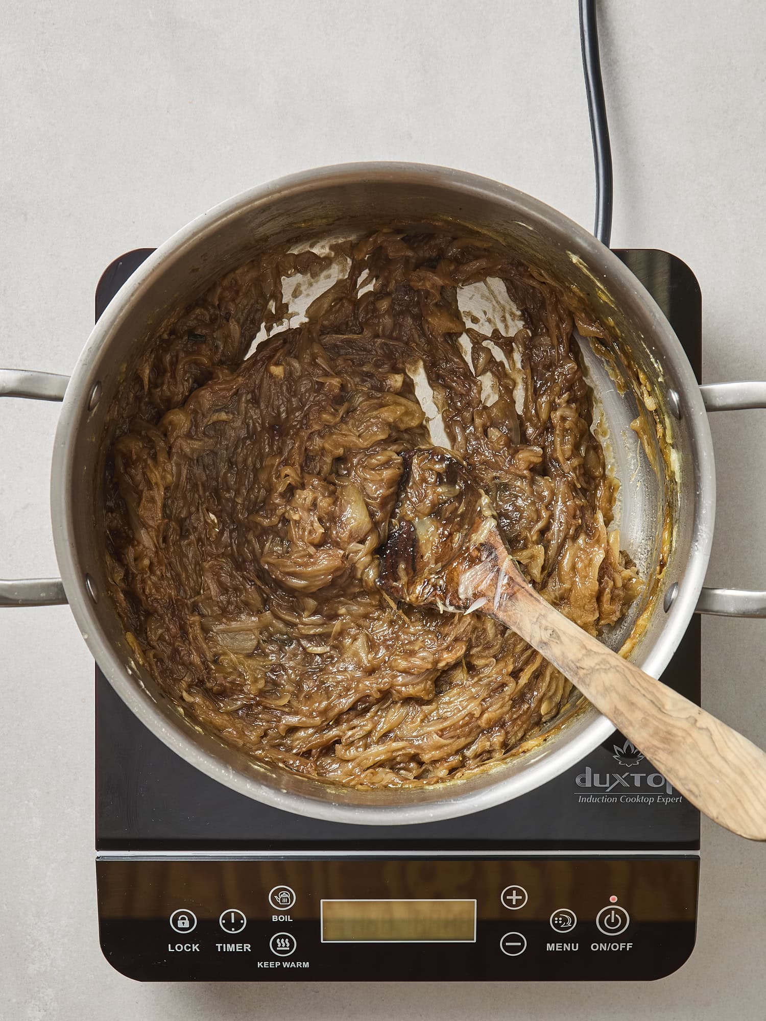 Caramelized onions in a pot after cooking.