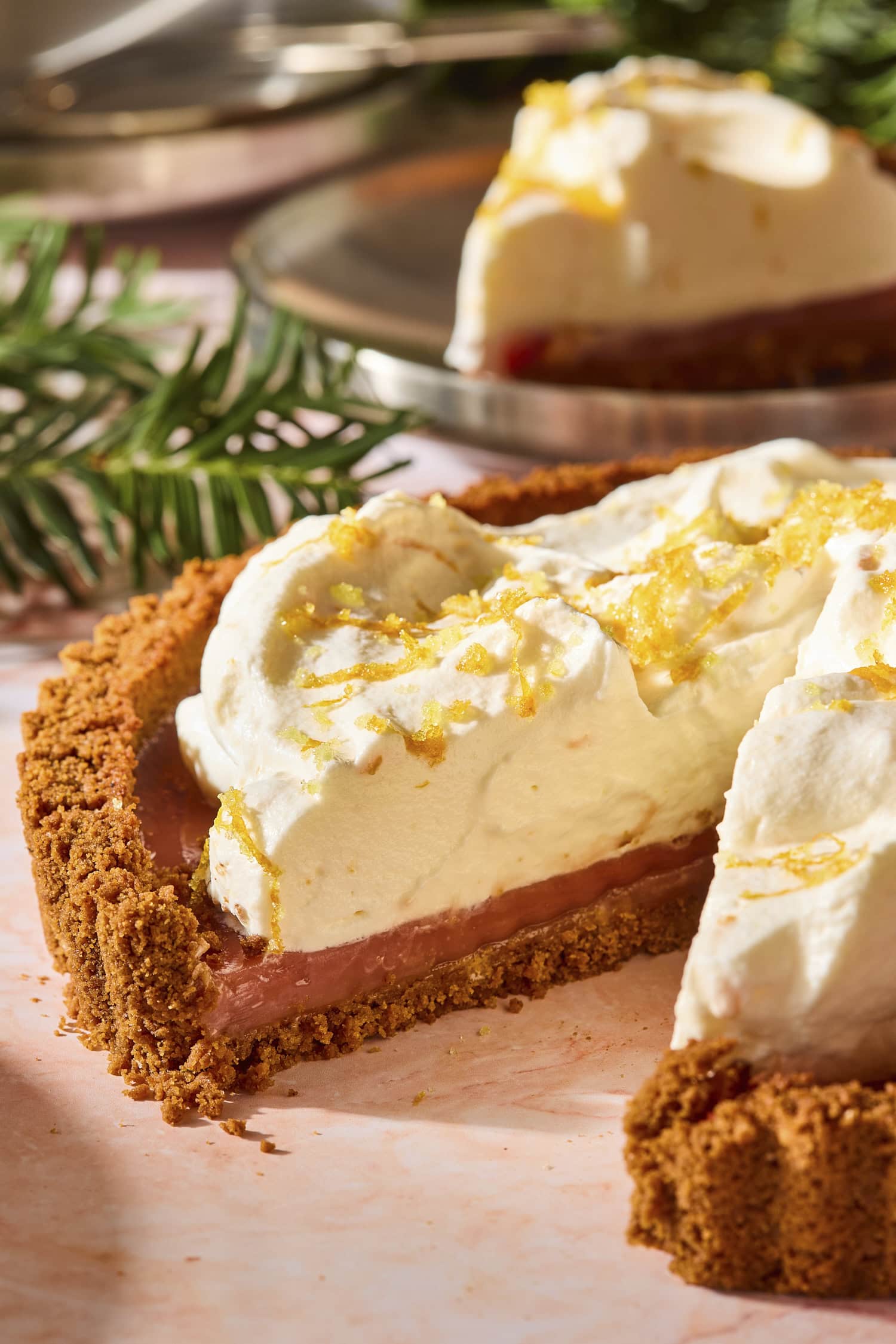 Cranberry tart with a slice missing showing the interior texture.