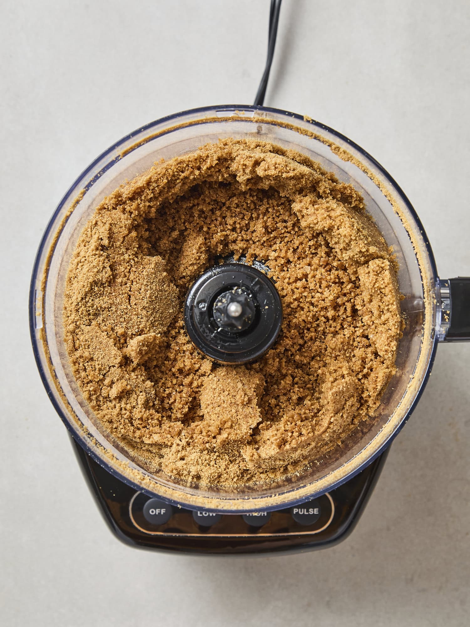 Food processor with gingersnap crumbs for a crust.