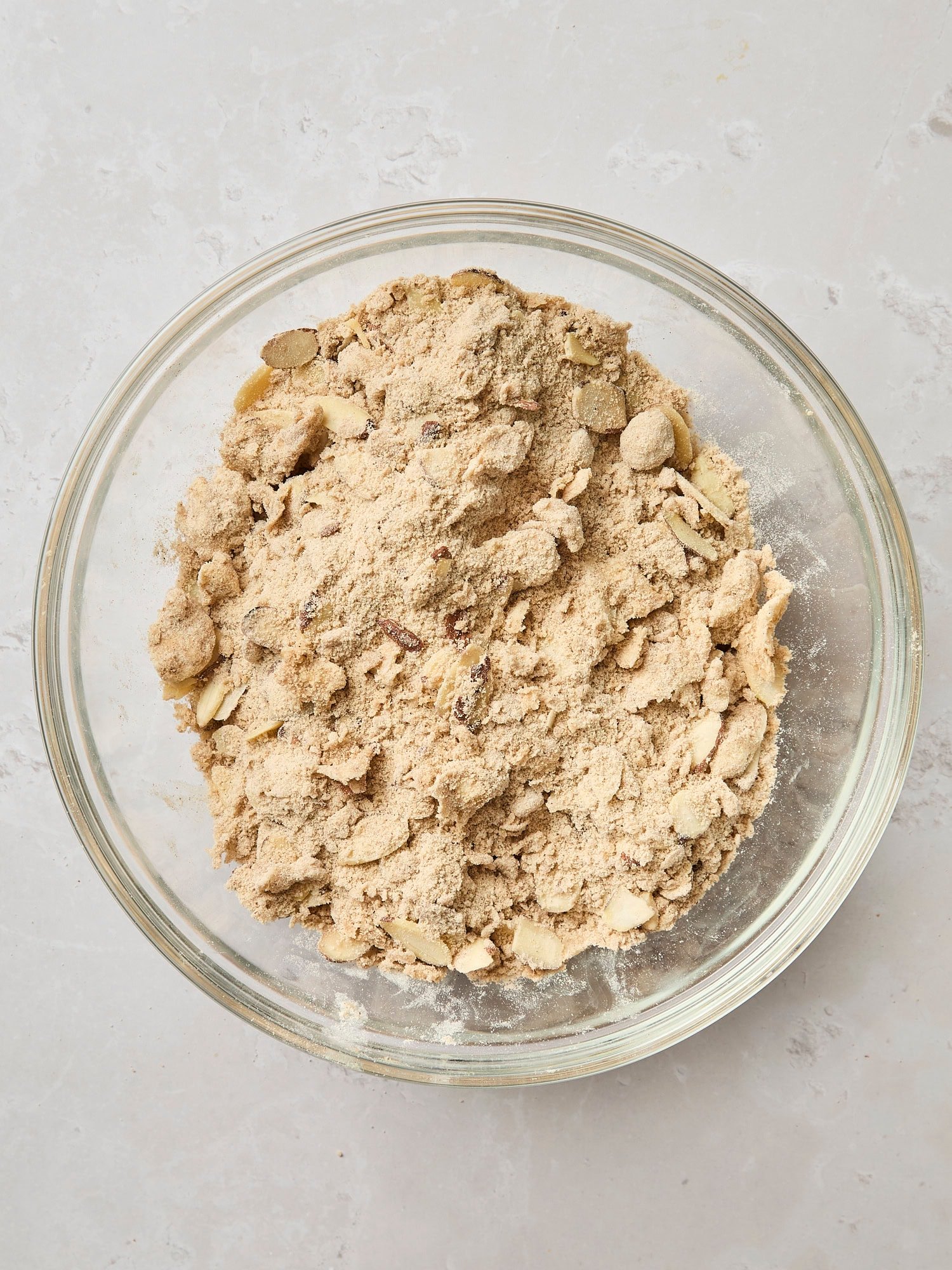 Glass bowl with mixed streusel almond topping.