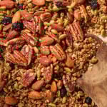 Homemade granola with nuts and oats after being toasted in the oven.