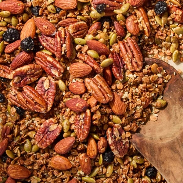 Homemade granola with nuts and oats after being toasted in the oven.