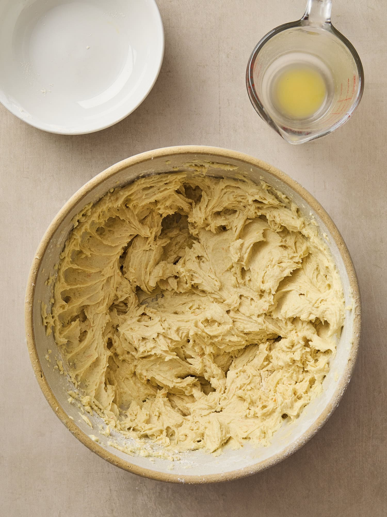 Bowl with batter after dry and wet ingredients are added.