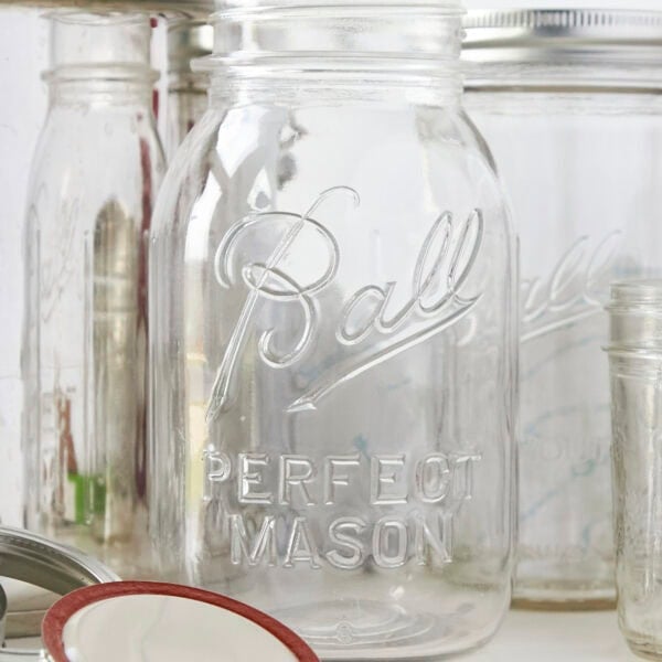 Glass jars, rings, and lids needed for canning.