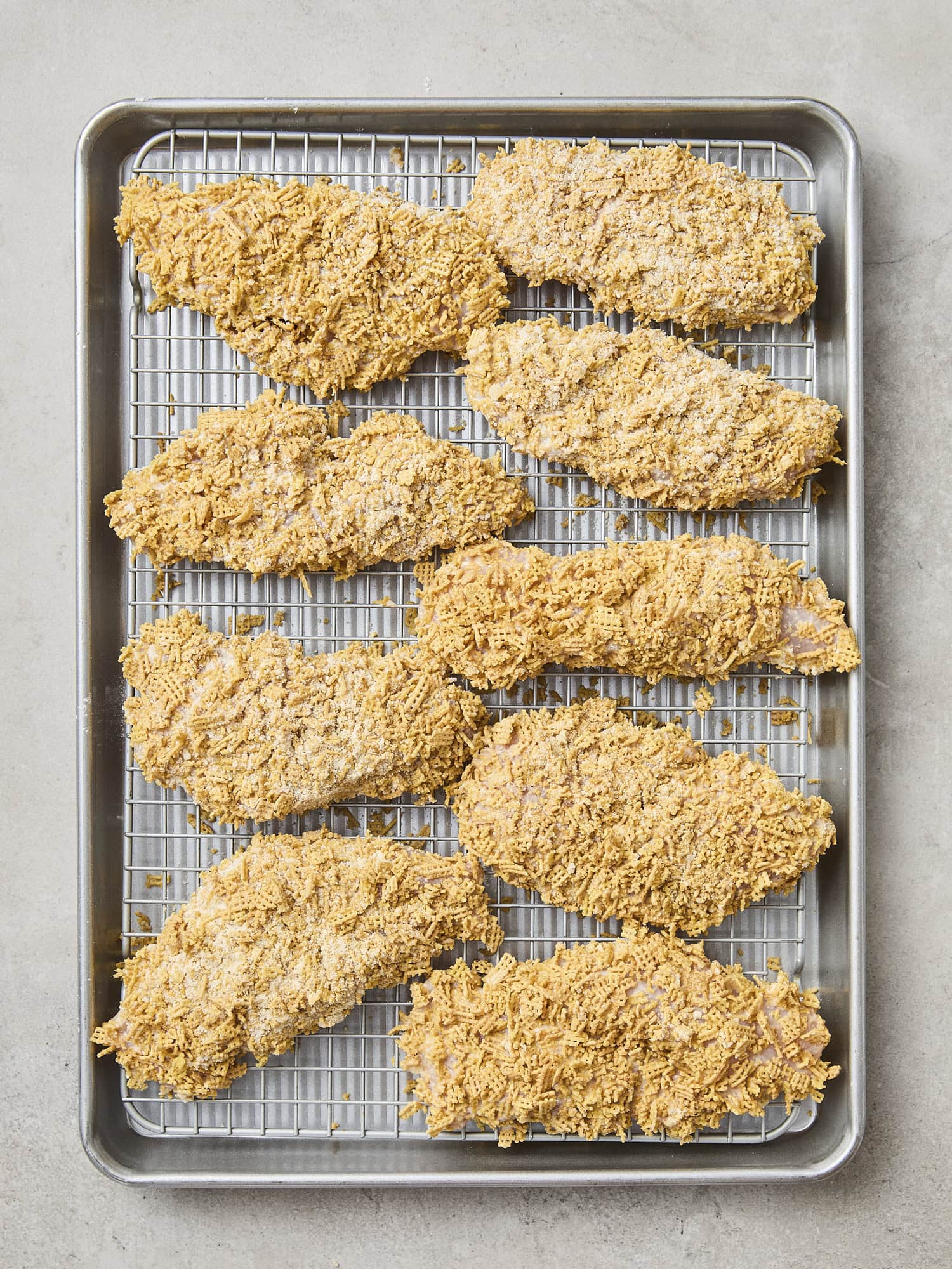 Crispy chicken strips before going into the oven to bake.