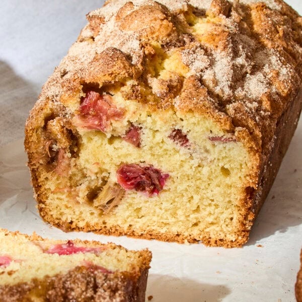 Rhubarb buttermilk cake with pieces of rhubarb in loaf.