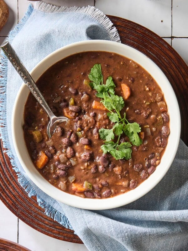 Black bean soup recipe with spoon.