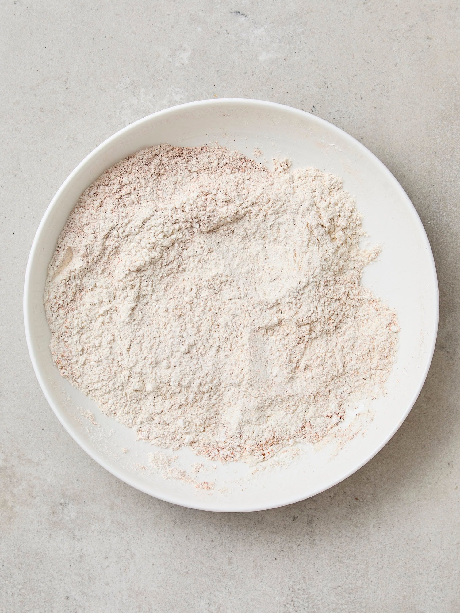 Bowl filled with flour and cornstarch mixture.