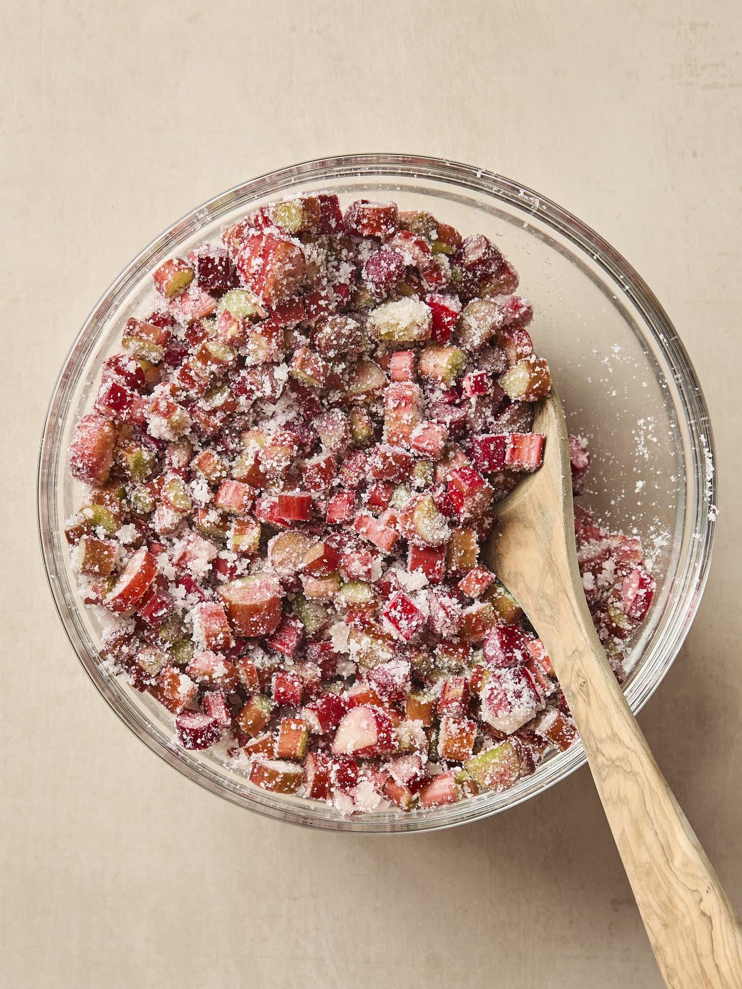Glass bowl with rhubarb pie filling.