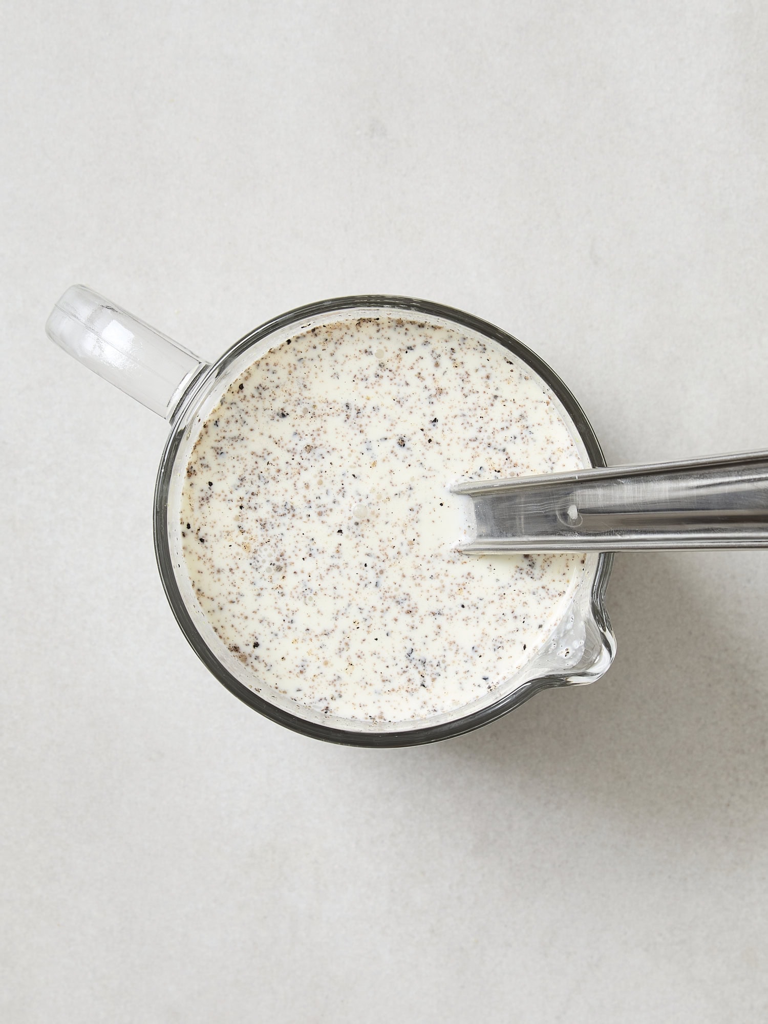 Cream mixture for homemade scalloped potatoes recipe.