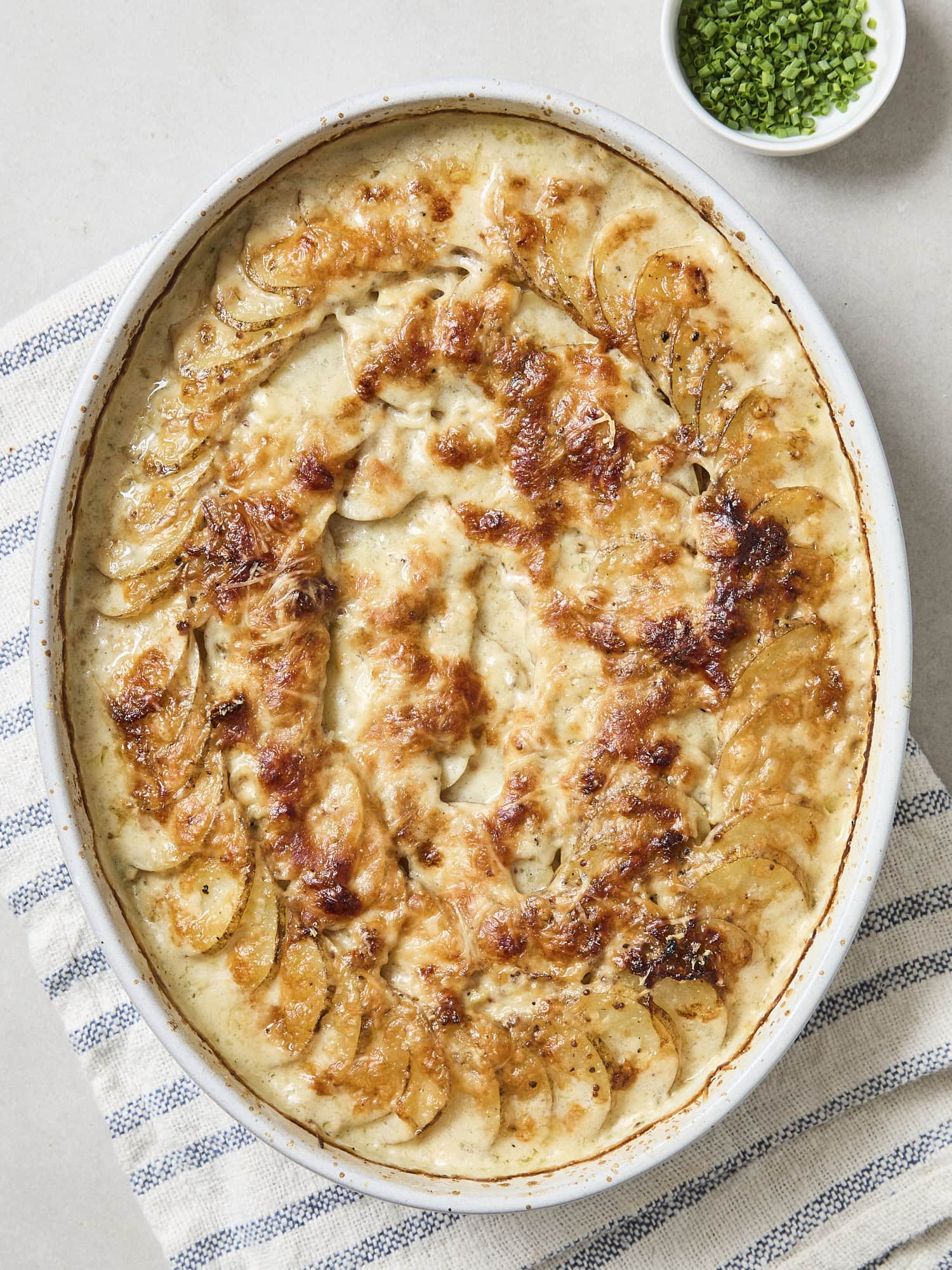 Golden brown baked scalloped potatoes.