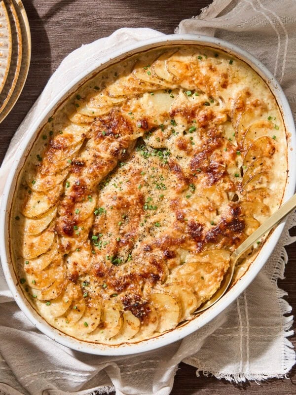 Baking dish with homemade scalloped potatoes.