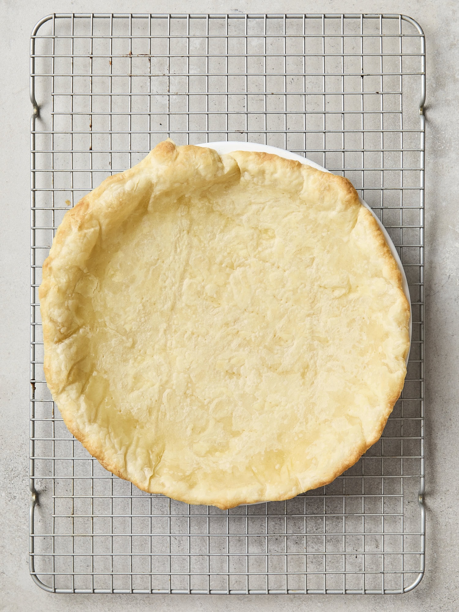 Partially baked crust for asparagus quiche.