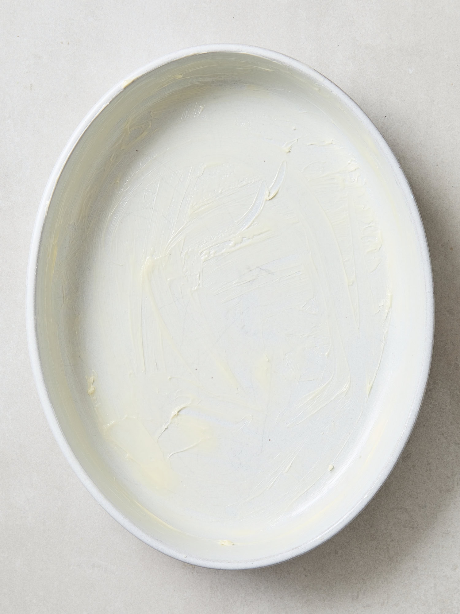 Baking dish ready for scalloped potatoes.