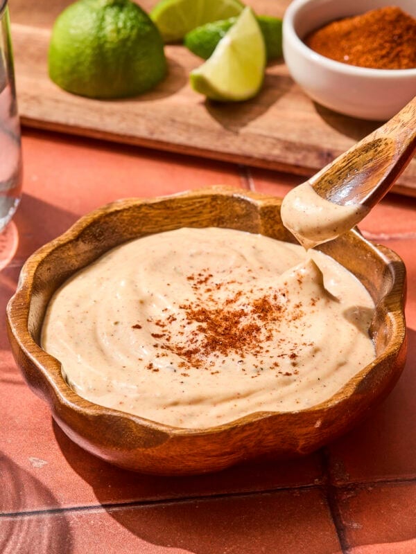 Spoon holding chipotle mayo showing texture.